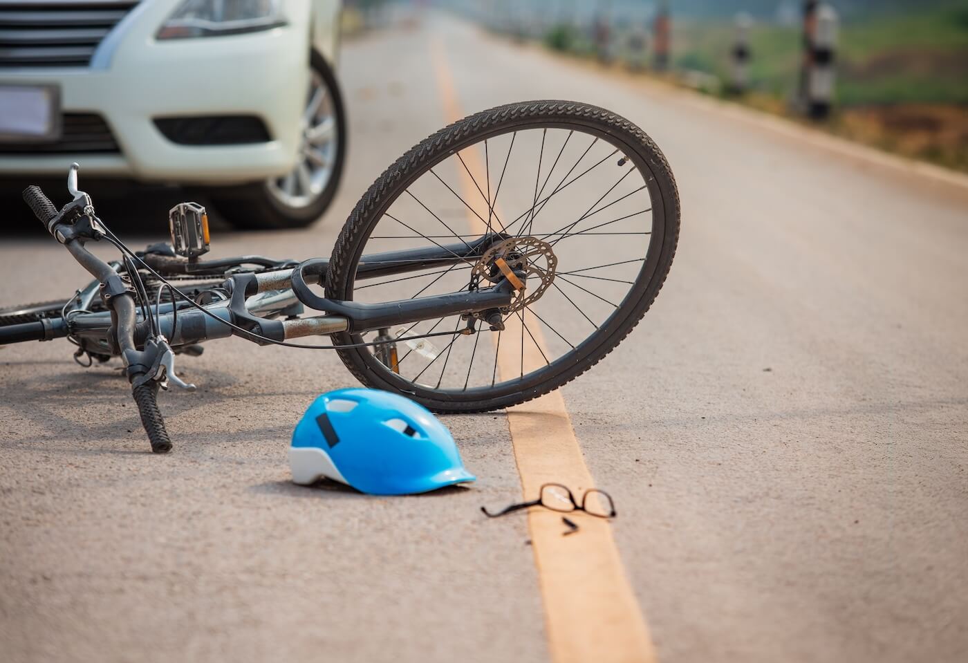 Car accident with bicycle on the road