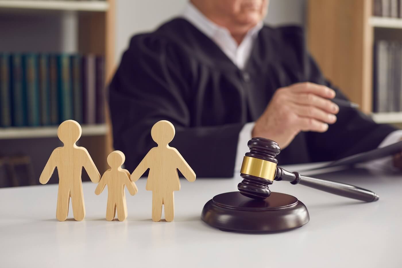Gavel, sound block, and small wooden figures